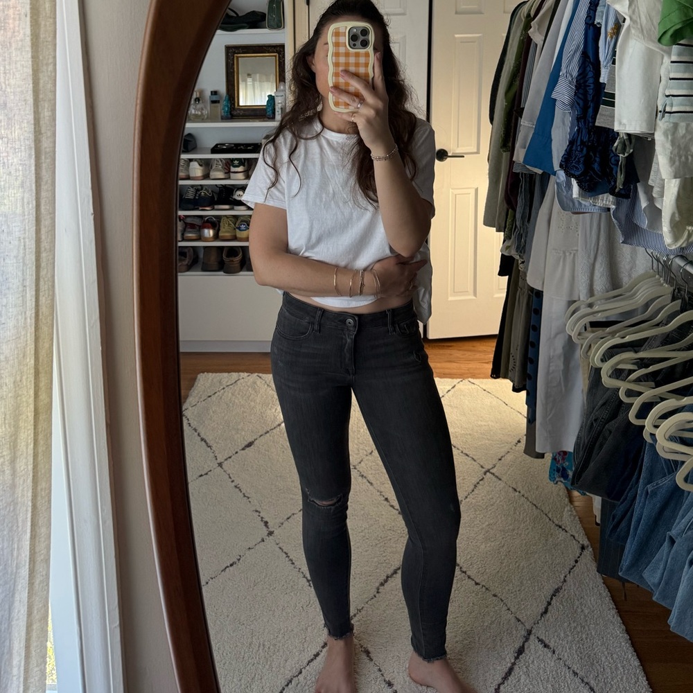 DL1961 dark wash grey skinny jeans size 26; raw hem, ripped knee